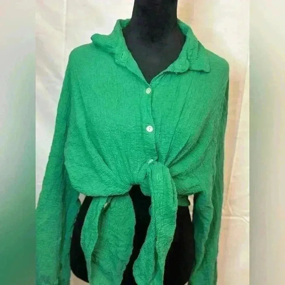 Green button up shirt
